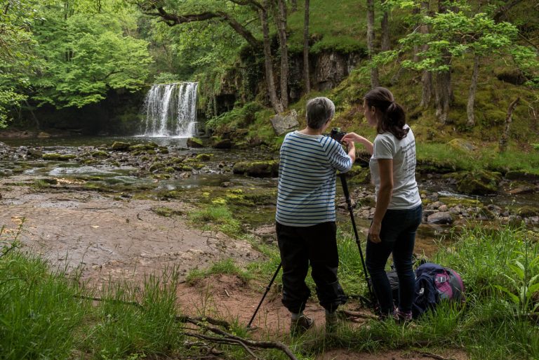 Sarah Howard, photographer and owner of Image Seen Photography Workshops giving one to one instruction.